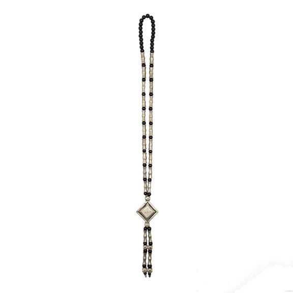 Necklace with silver beads, round black glass beads, and a diamond shaped pendant