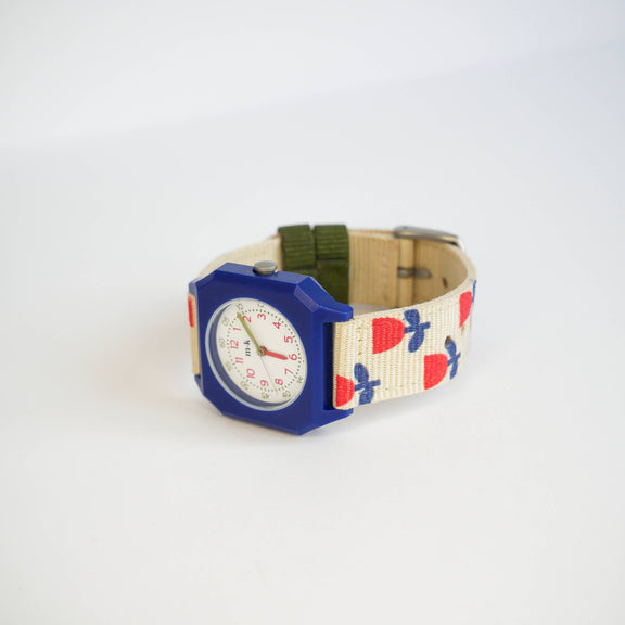Colorful watch with a patterned strap on a white background