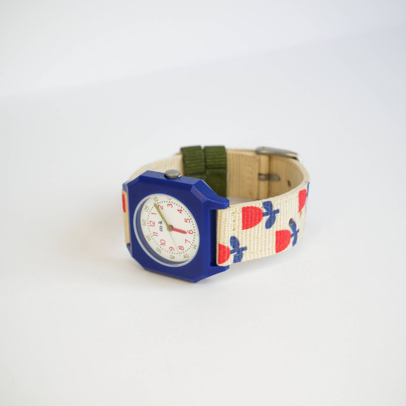 Colorful watch with a patterned strap on a white background