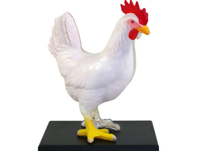 White rooster figurine with red comb on a black base against a white background