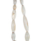 A strand of oval shaped white agate beads