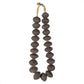 A strand of round clay beads