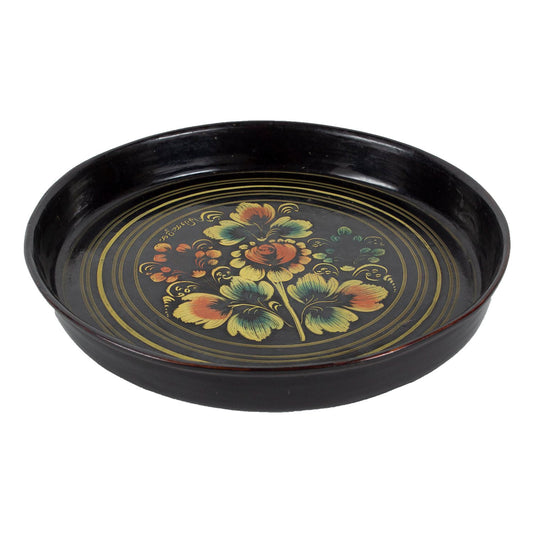 Black lacquerware dish with painted flowers, side view