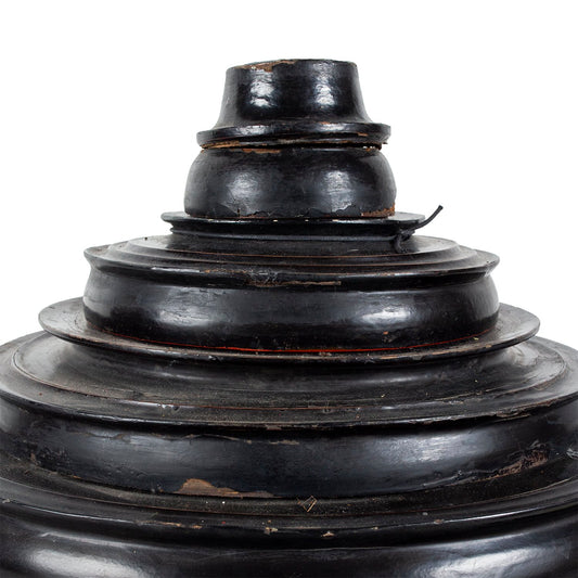 Black lacquerware offering basket with multi piece lid, close up