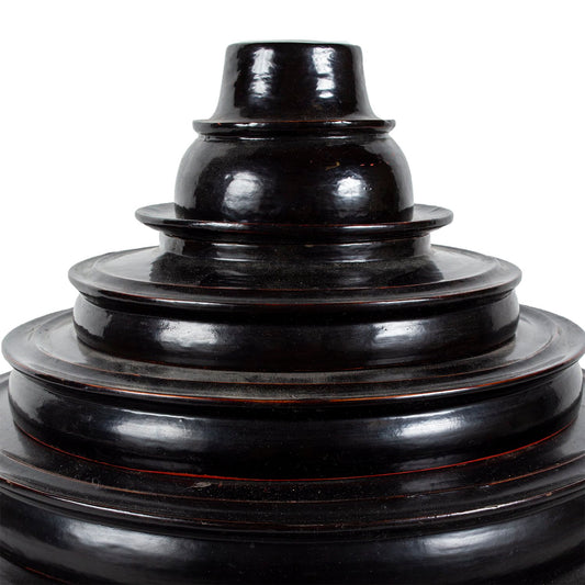 Black lacquerware offering basket with multi piece lid, close up