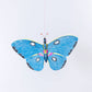 Colorful butterfly-shaped kite on a white background