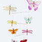 Colorful insect-themed mobile with butterflies, dragonflies, and ladybugs on a white background.