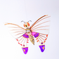 Colorful butterfly-shaped kite on a white background