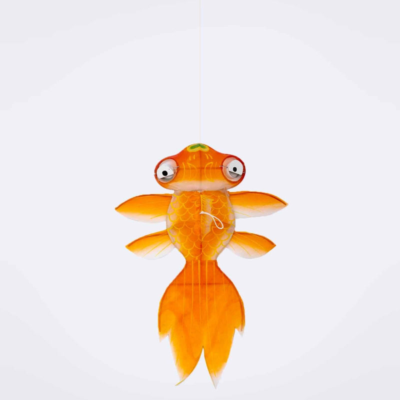 Toy goldfish with a white background