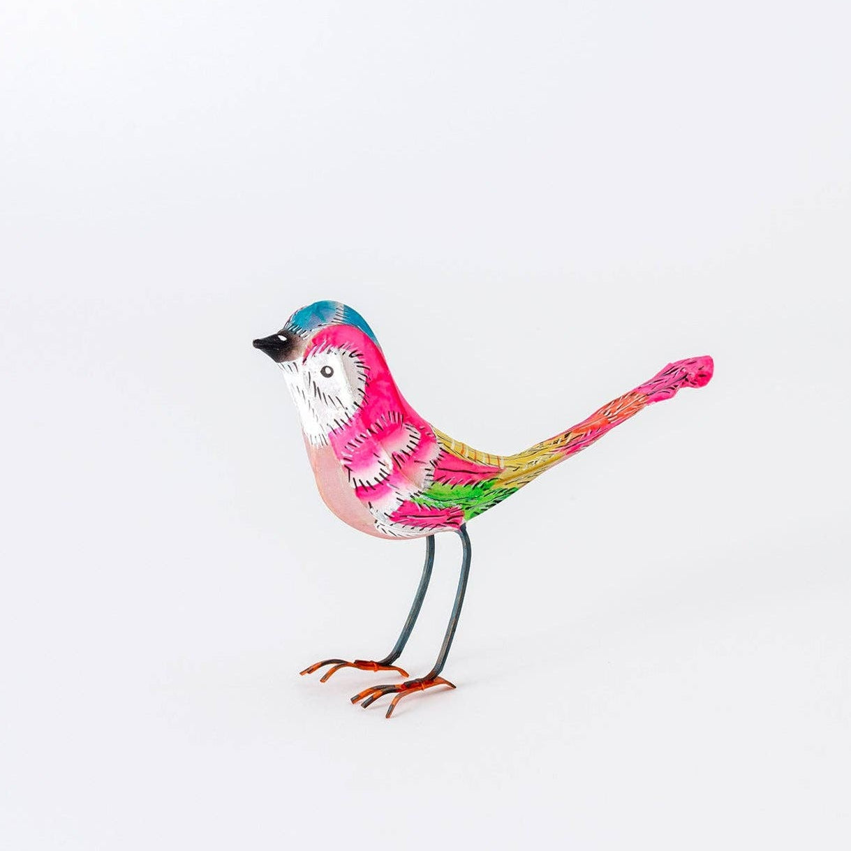 Colorful bird figurine on a white background