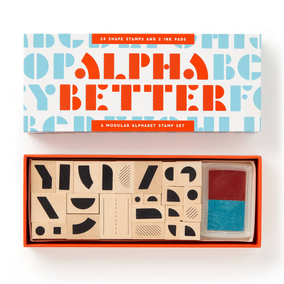 Alphabet stamp set with stamps and ink pads in a box, featuring colorful lettering on the packaging.