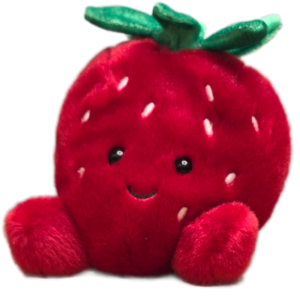 Plush strawberry toy with a smiling face on a white background