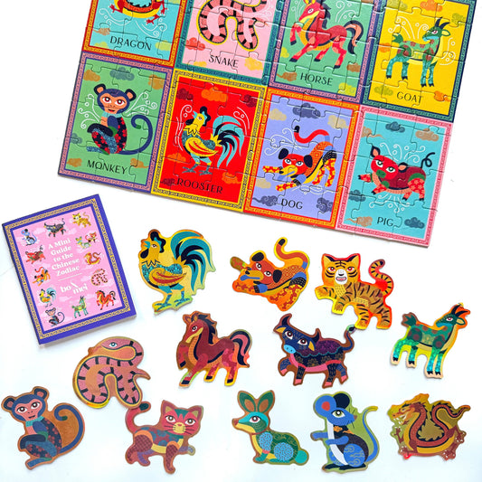 Set of colorful animal-themed puzzles and figures on a white background