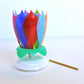 Multicolored flower birthday candle