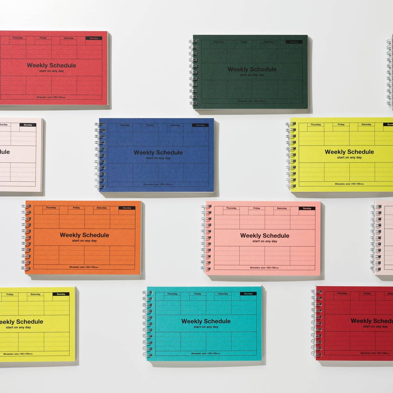 Collection of colorful weekly schedule planners on a white background