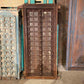 Brown decorative wood shutters with teak and iron details