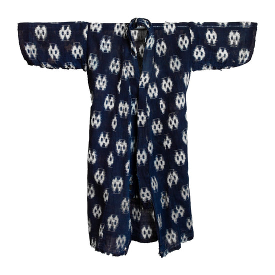 Navy blue kimono with white patterns on a white background