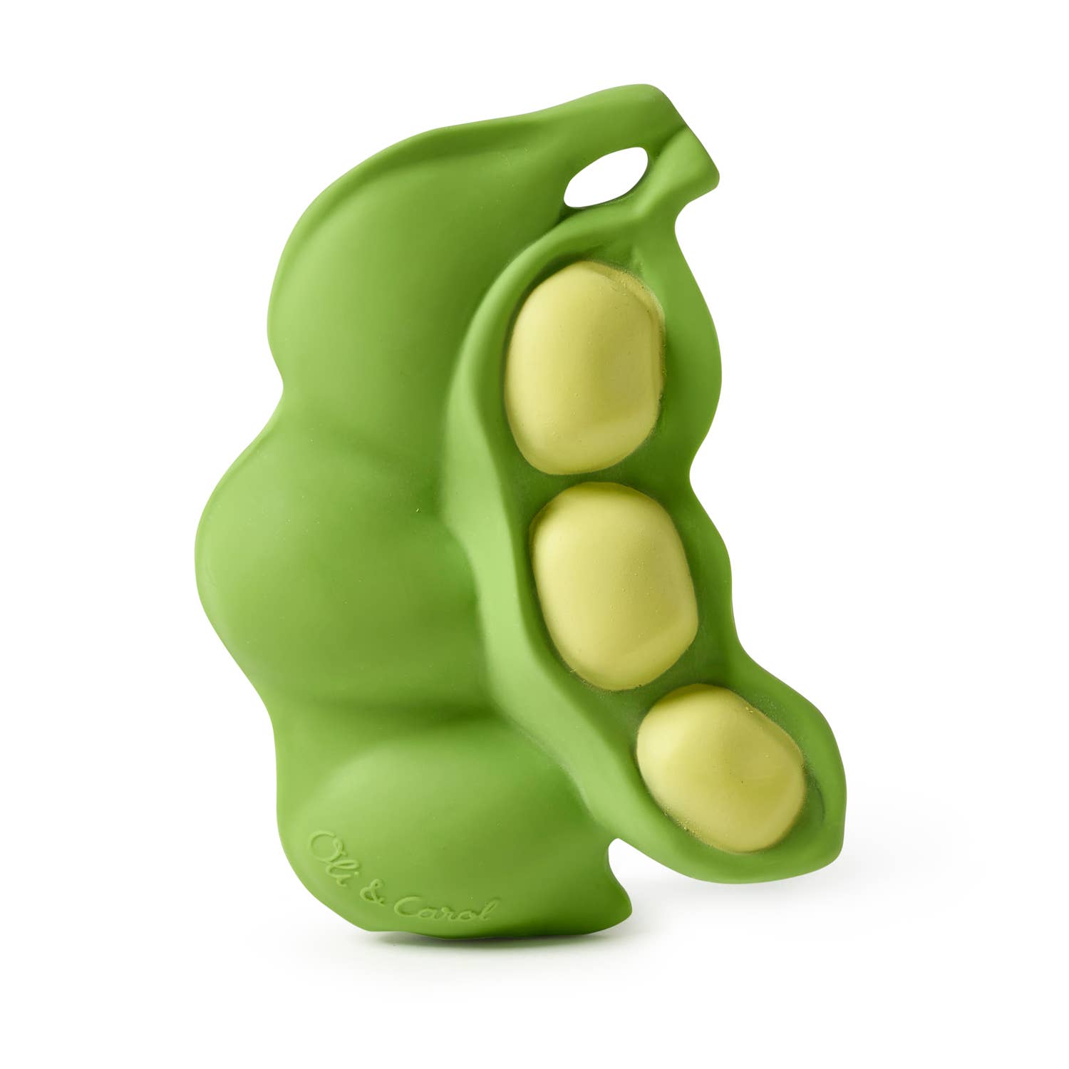 Green plastic toy shaped like a pod with three yellow peas on a white background