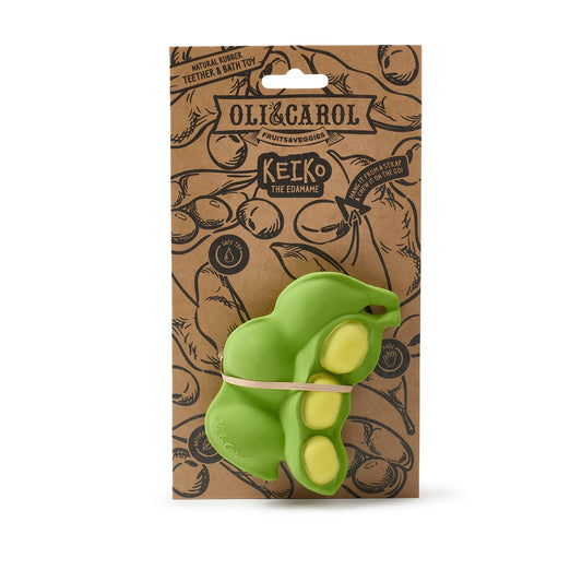 Green avocado-shaped toy with 'Oli & Carol' branding on a brown package.