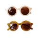 Two pairs of sunglasses with different frame designs on a white background