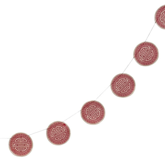Decorative string of red circular flags with white patterns on a white background