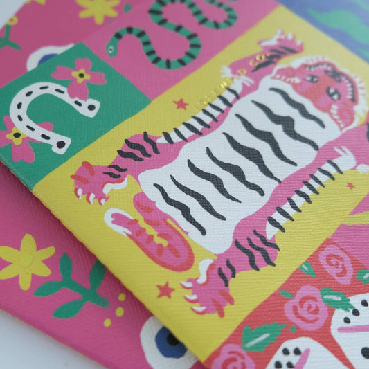 Colorful yealy planner with animal illustrations on a white background