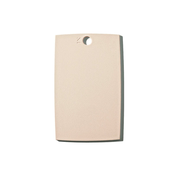 small beige cutting board