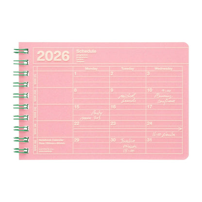 Pink planner with 2026 calendar on a white background