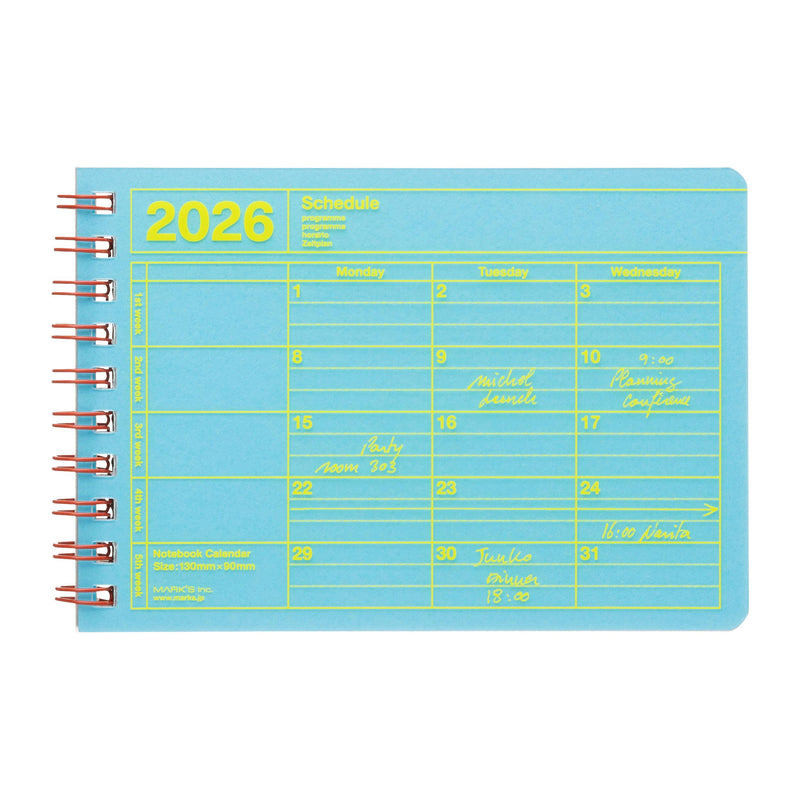 2026 planner with blue cover and yellow text on a white background