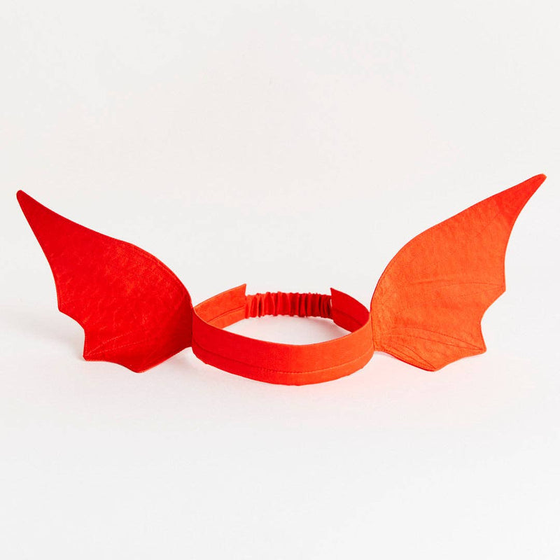 Red and orange headband with wing-like extensions on a white background