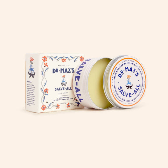Dr. Max's Salve-All container with lid open on a white background