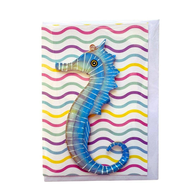 Greeting card with a blue seahorse design on a colorful wavy background