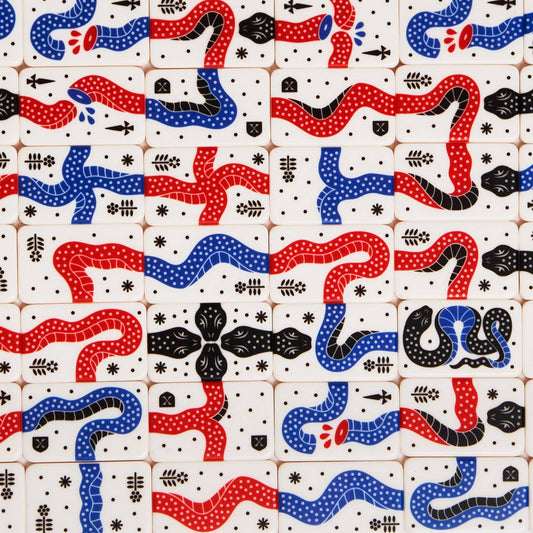 Pattern of red, blue, and black abstract shapes on a white background