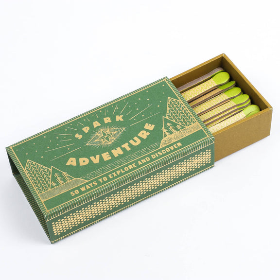 Matches in a green and brown box with 'Spark Adventure' text on a white background