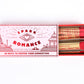 Matchbook with 'Spark Romance' design and matches on a white background