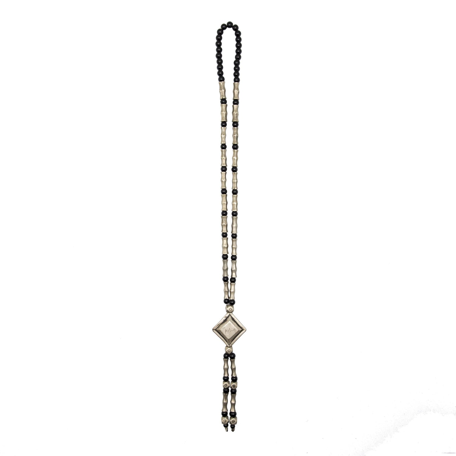 Necklace with silver beads, round black glass beads, and a diamond shaped pendant