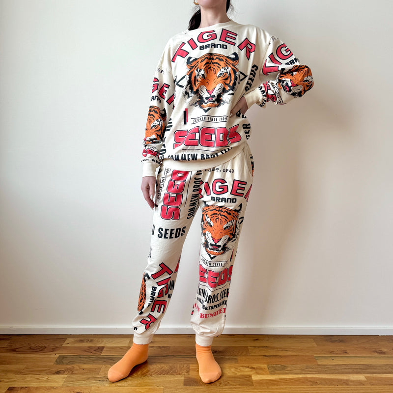 Person wearing a tiger-themed outfit with a white background