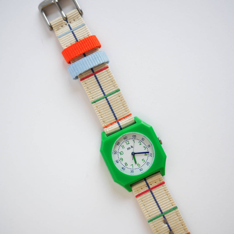 Wristwatch with a colorful strap on a white background