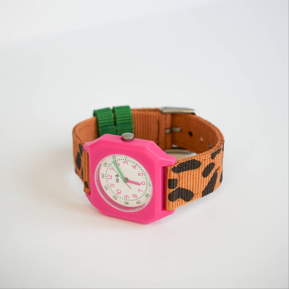 Colorful watch with a pink case and brown strap on a white background