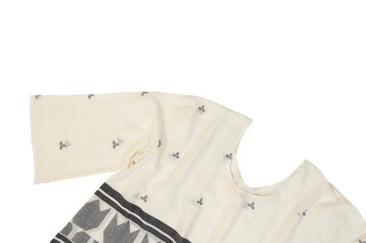 slightly sheer cotton jamdani top. white and black detail angle