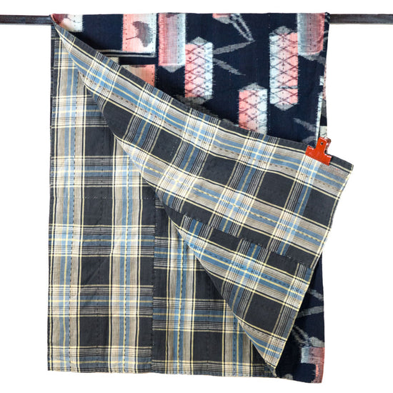 Plaid fabric with a patterned background