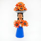Flower Vendor with Orange Blooms