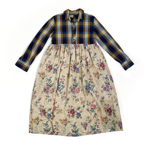 Brand The Cut Remade dress with plaid shirt top and floral skirt on a white background