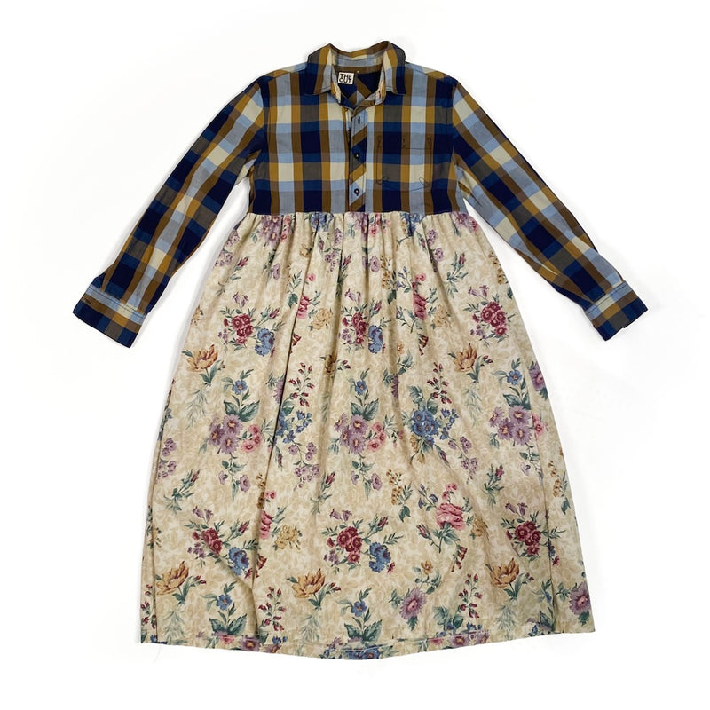 Brand The Cut Remade dress with plaid shirt top and floral skirt on a white background