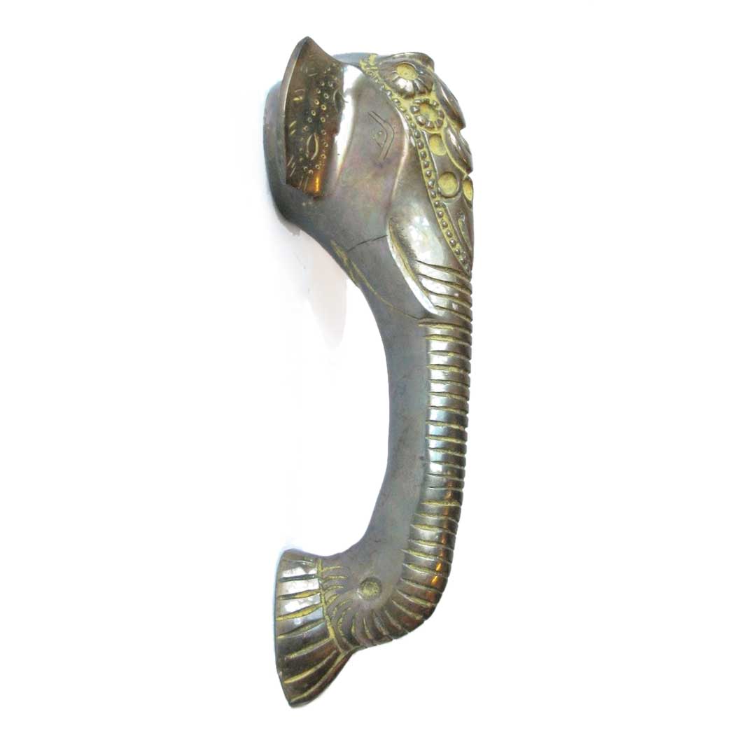 Brass elephant head shaped door handle with green paint details, side view