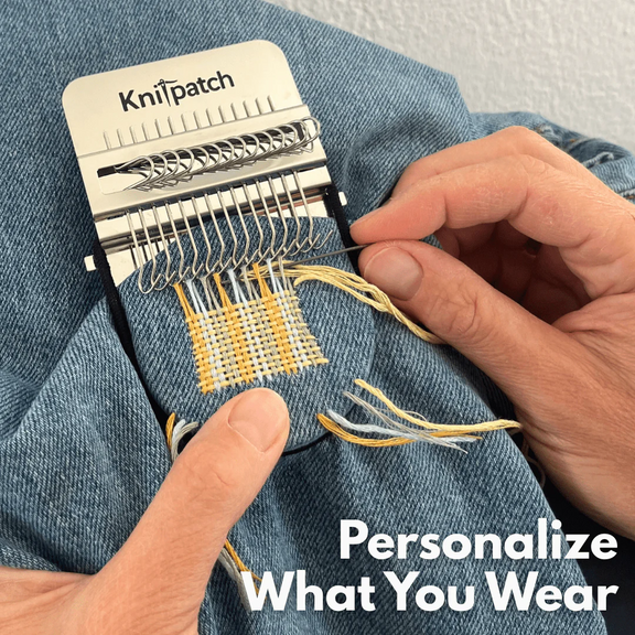 Person using a Knitpatch product to patch a hole in denim fabric.