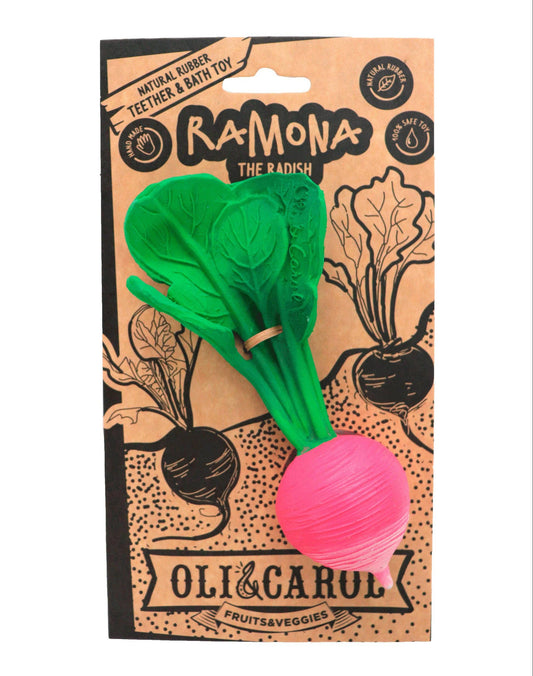Teething toy with green radish-shaped top and pink ball on a branded packaging