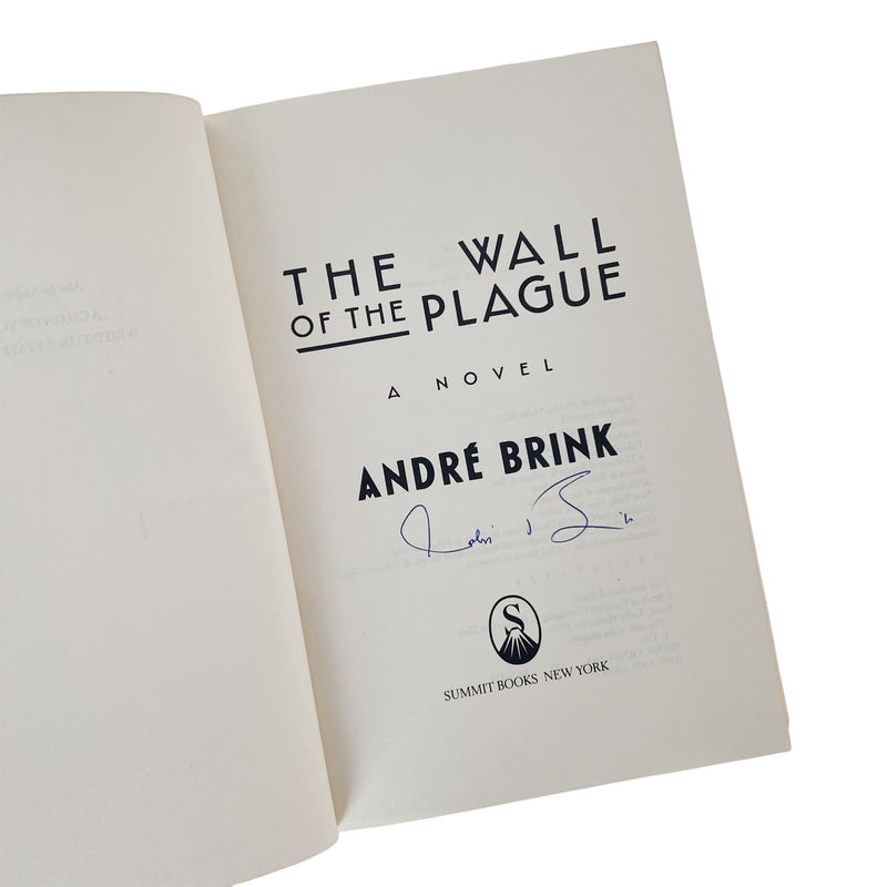 Open book with 'The Wall of the Plague' Signed by André Brink on a white background
